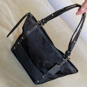Black coach handbag used twice has been sitting in the top of my closet